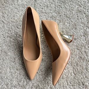New without tags. Katy Perry Collections Tan Heels with Silver Accent. Size 7